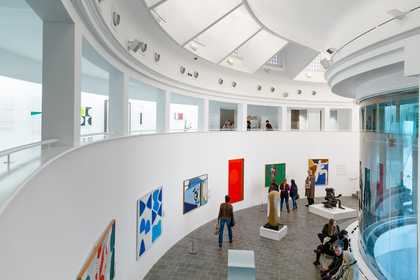 people looking at Modern art display